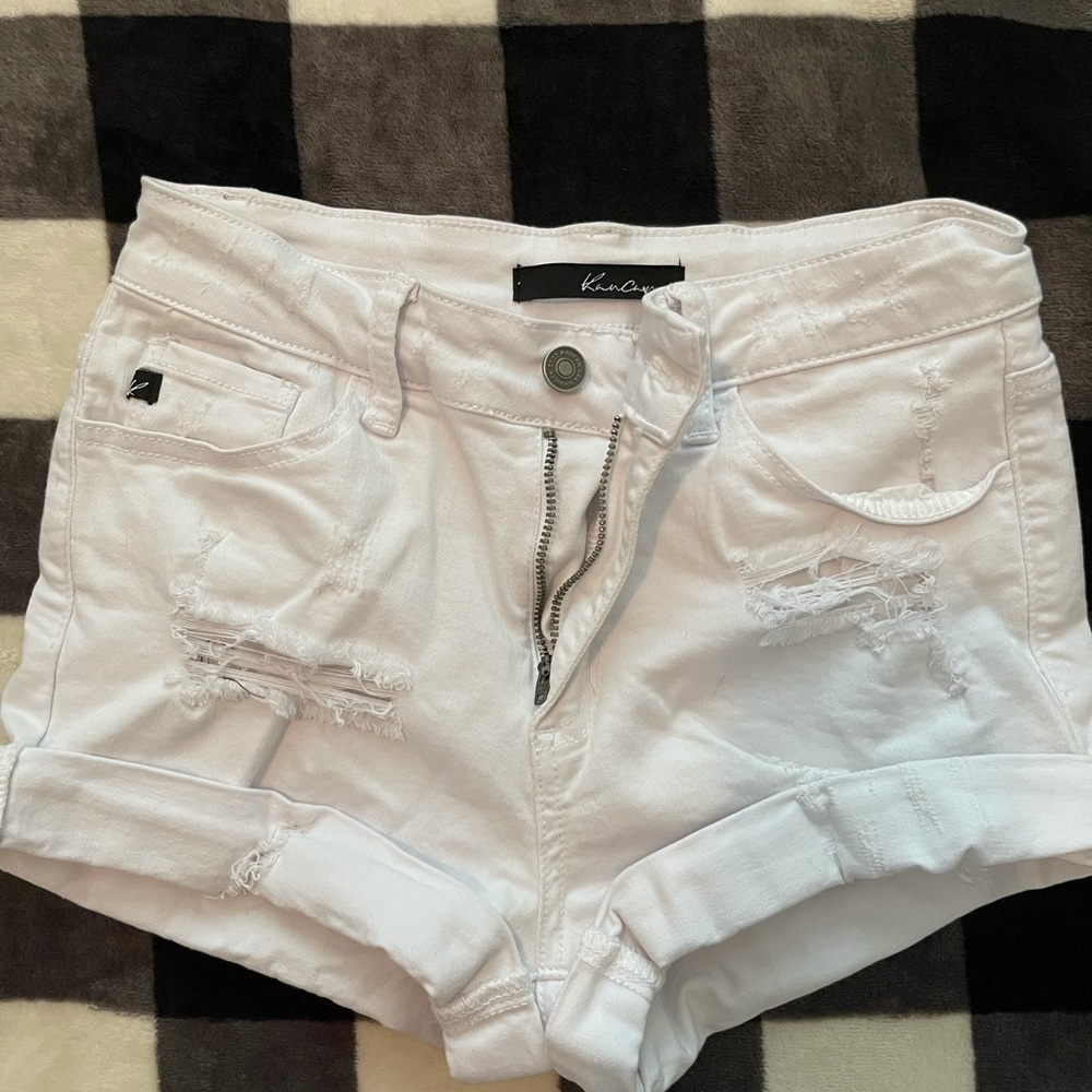 White distressed jean shorts